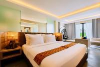 Big Dragon Villas Ubud客房内的一张或多张床位