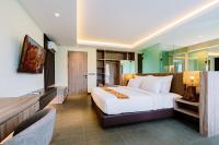 Big Dragon Villas Ubud客房内的一张或多张床位