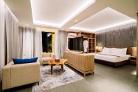 Big Dragon Villas Ubud客房内的一张或多张床位