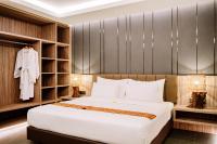 Big Dragon Villas Ubud客房内的一张或多张床位