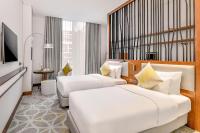 Grand Mercure Dubai City的电视和/或娱乐中心