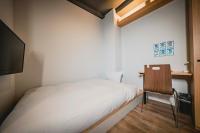hotel atarayo osaka客房内的一张或多张床位