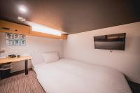 hotel atarayo osaka客房内的一张或多张床位