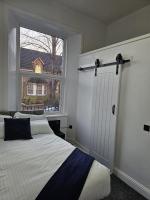 Central Hotel Edinburgh客房内的一张或多张床位