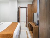 Hotel Kinara Grand客房内的一张或多张床位