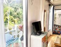 Ashitoku Bungalow - Vacation STAY 67581v的电视和/或娱乐中心