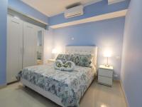 SERENITY SUITES with ROOFTOP POOL, BEACH CLUB, SPA, RESTAURANTS客房内的一张或多张床位