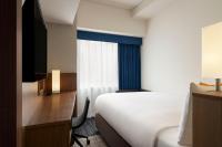 Four Points Flex by Sheraton Nagoya Station客房内的一张或多张床位