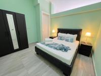 SERENITY SUITES with ROOFTOP POOL, BEACH CLUB, SPA, RESTAURANTS客房内的一张或多张床位