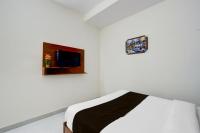 Super Hotel O RUBY GRAND INN的电视和/或娱乐中心