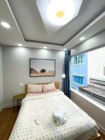 Nhà 4Brs 5wc Bùi Viện Quận 1客房内的一张或多张床位