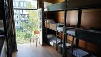 Onefam Amstel客房内的一张或多张床位
