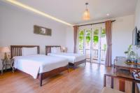 Ancient Garden Boutique Hoi An客房内的一张或多张床位