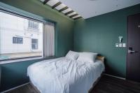 Boro Hanok Hostel in Myeongdong客房内的一张或多张床位