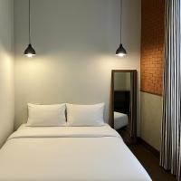 Khunluang Hostel客房内的一张或多张床位