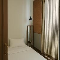 Khunluang Hostel客房内的一张或多张床位