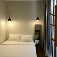 Khunluang Hostel客房内的一张或多张床位