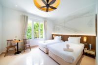 Sujet Residence Da Nang by Haviland客房内的一张或多张床位