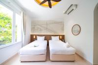 Sujet Residence Da Nang by Haviland客房内的一张或多张床位