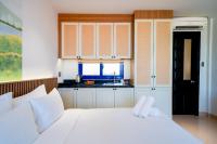 Sujet Residence Da Nang by Haviland客房内的一张或多张床位