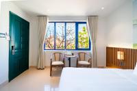 Sujet Residence Da Nang by Haviland客房内的一张或多张床位