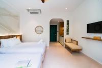 Sujet Residence Da Nang by Haviland客房内的一张或多张床位
