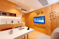 Shama Hub Metro South Hong Kong的电视和/或娱乐中心