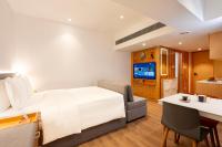 Shama Hub Metro South Hong Kong客房内的一张或多张床位