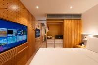 Shama Hub Metro South Hong Kong的电视和/或娱乐中心