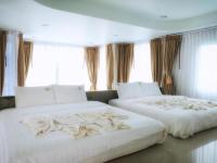 The Key Hotel客房内的一张或多张床位