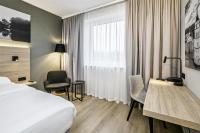 Park Inn by Radisson Vilnius Airport Hotel & Conference Centre客房内的一张或多张床位