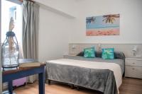 Hotel Solmar客房内的一张或多张床位