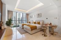 Chalet Homes - LUX New Studio With 2 Double Beds in Downtown Dubai客房内的一张或多张床位