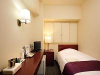 Ueda Plaza Hotel客房内的一张或多张床位