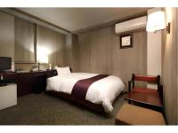 Ueda Plaza Hotel客房内的一张或多张床位