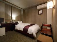 Ueda Plaza Hotel客房内的一张或多张床位