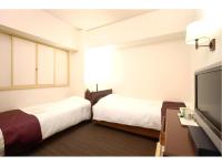 Ueda Plaza Hotel客房内的一张或多张床位