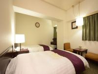 Ueda Plaza Hotel客房内的一张或多张床位