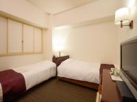 Ueda Plaza Hotel客房内的一张或多张床位