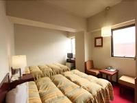 Ueda Plaza Hotel客房内的一张或多张床位