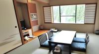 Tateyama Kokusai Hotel的电视和/或娱乐中心