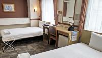 热海站前东横旅馆(Toyoko Inn Atami Ekimae) 客房内的一张或多张床位
