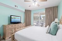 Ariel Dunes II 101客房内的一张或多张床位
