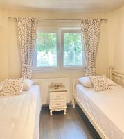 Lorantina Luxury Sea View Holiday House close to Barbati &amp; Ipsos Beach with Starlink WiFi客房内的一张或多张床位