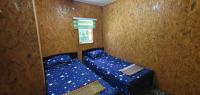 Chalet Kampong Guar, Manong客房内的一张或多张床位