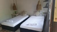Kite Eco House Salinas del rey客房内的一张或多张床位