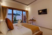 Luxury Nanda villa Ubud客房内的一张或多张床位