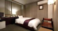 Ueda Plaza Hotel客房内的一张或多张床位