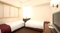 Ueda Plaza Hotel客房内的一张或多张床位