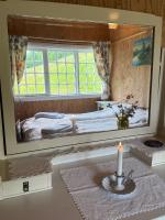 The Bungalow - Experience the 20s客房内的一张或多张床位
